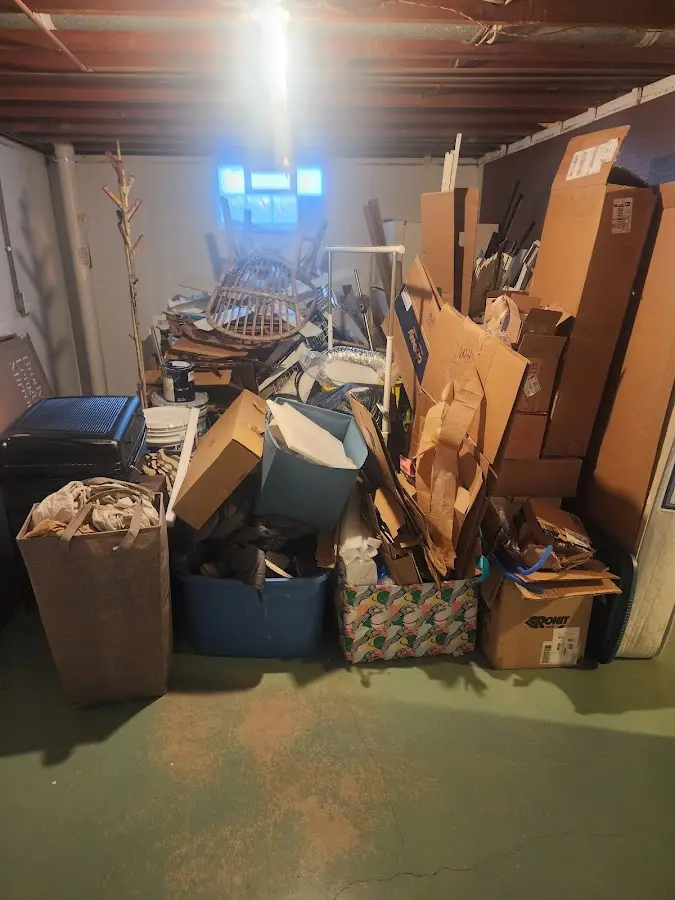 Roll-off dumpster container at job site for 20 Yard Dumpster Rental in Iron River